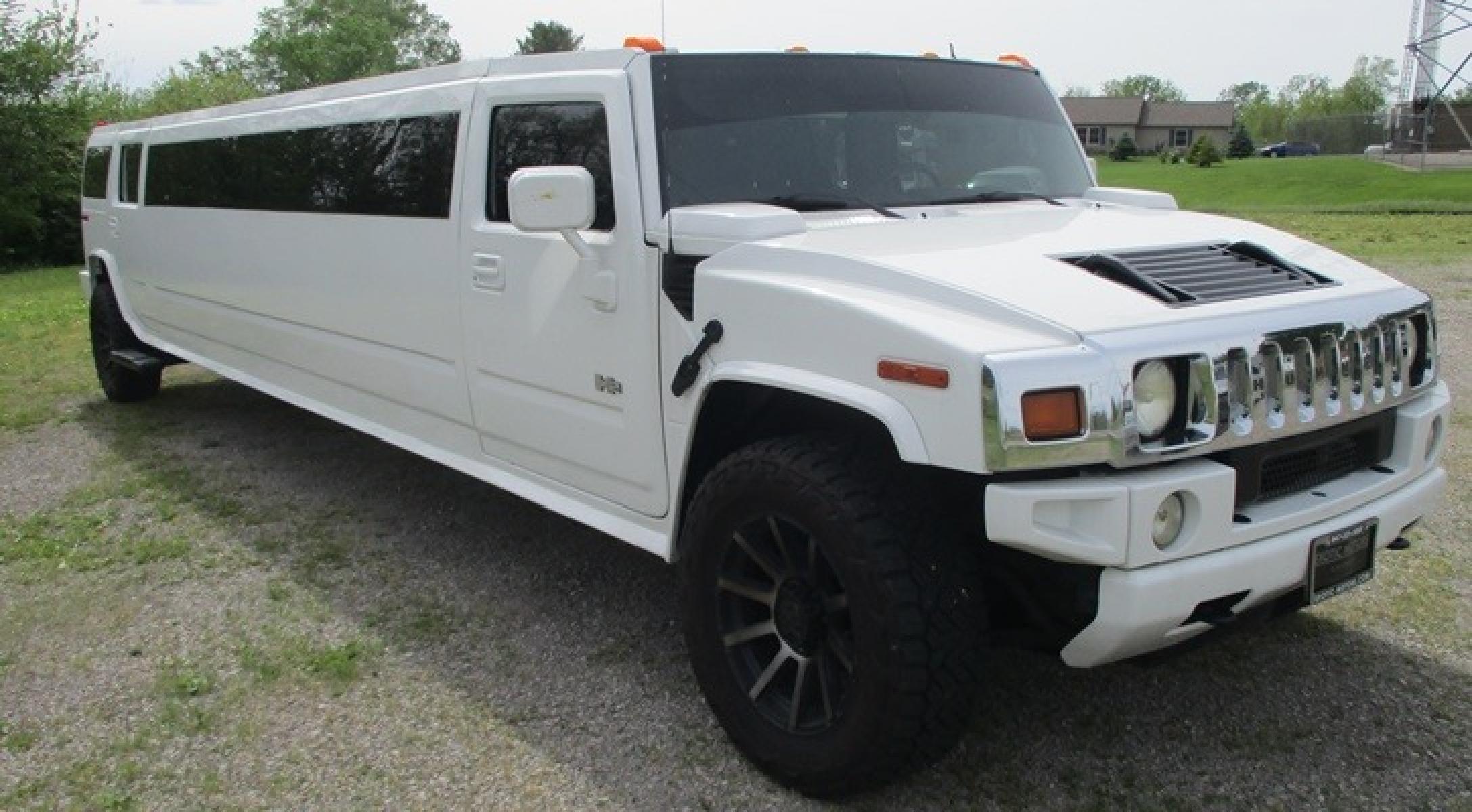 2005 White /White/Black Hummer H2 , located at 1725 US-68 N, Bellefontaine, OH, 43311, (937) 592-5466, 40.387783, -83.752388 - 2005 Hummer H2 175" SUV VIP Limousine, White w/White/black leather interior, Front/Rear Ait, Flat Screens, AM/FM/CD reconditioned Interior, LOADED - Photo #2